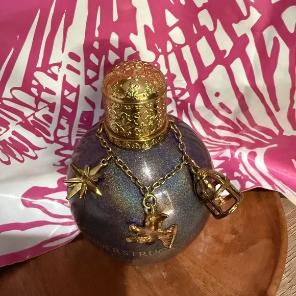 Elegant Gold and Blue Decorative Bottle with Intricate Design - Picture 3 of 4